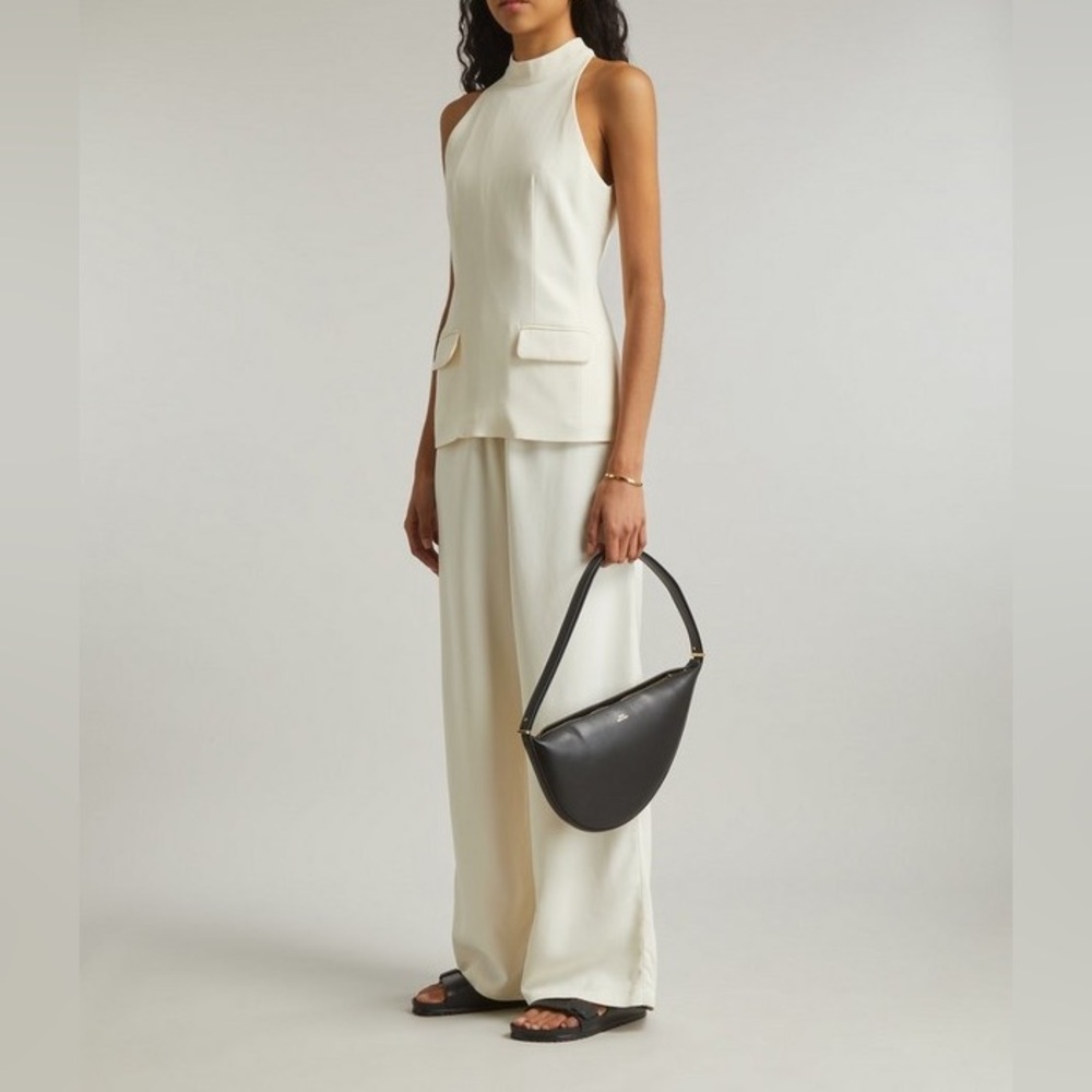 White sleeveless dress top